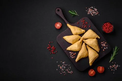 Delicious pancakes triangular shape with meat, salt and spices Delicious p... 스톡 사진
