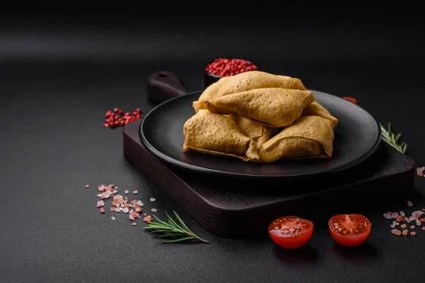 Delicious pancakes triangular shape with meat, salt and spices Delicious p... Stock Photos