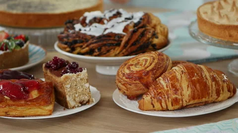 Delicious pastries on the pastry table Stock Footage 241562971