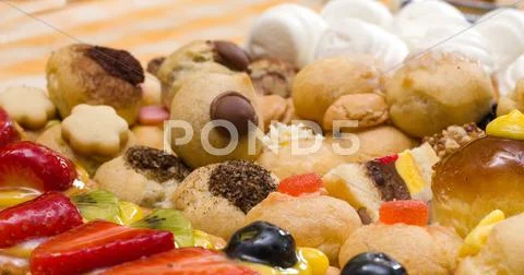 Delicious pastries, tarts and small cakes Stock Photos