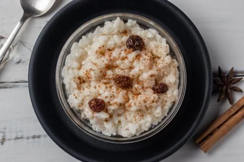 Delicious peruvian dessert rice with milk, cinnamon and rises. Stock Photos