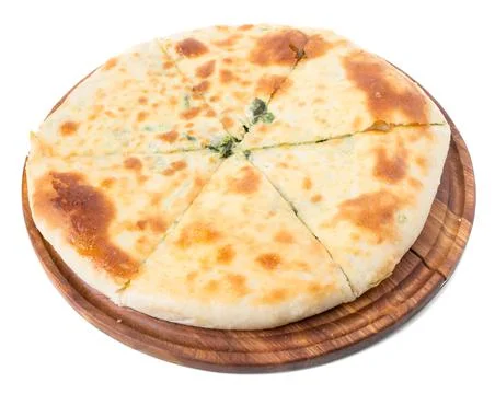 Delicious pie stuffed with spinach. Stock Photos
