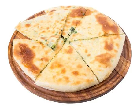 Delicious pie stuffed with spinach. Stock Photos