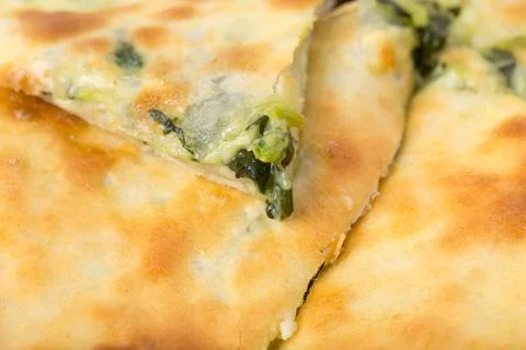 Delicious pie stuffed with spinach. Stock Photos