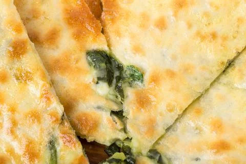 Delicious pie stuffed with spinach. Stock Photos