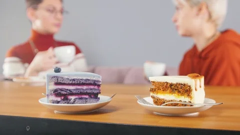 Delicious pieces of cake are standing on the table Stock Footage 118529293