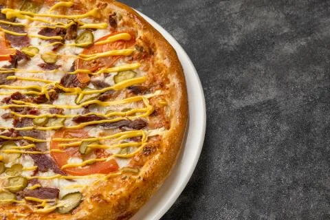 Delicious pizza cheeseburger Stock Photos