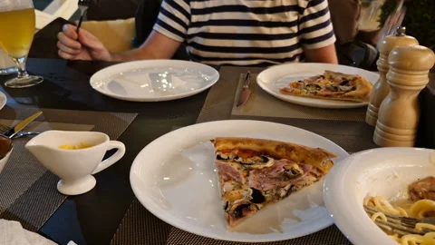 Delicious pizza close-up. Cafe. 4k Stock Footage 247243906