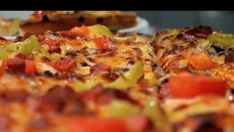 Delicious pizza close-up view. The concept of eating. Video stock 94804364