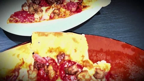 Delicious pizza featuring a combination of cheese and meat lovers toppings,.. Stock Footage 311793401