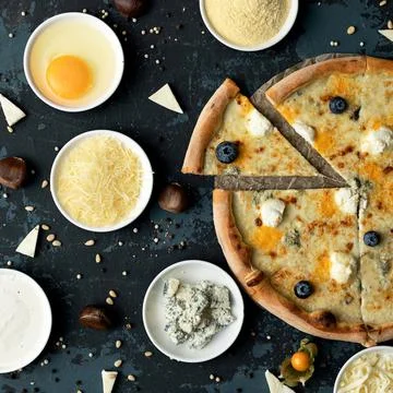 Delicious Pizza making process. Ingredients and whole cooked pizza on black Stock Photos