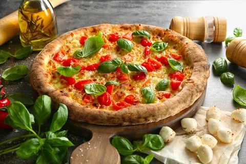 Delicious pizza on table Stock Photos