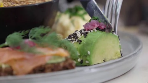 Delicious plate of salmon with avocado on the outside, Ketogenic diet Stock Footage 246733780