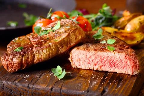 Delicious portion of medium rare beef steak Stock Photos