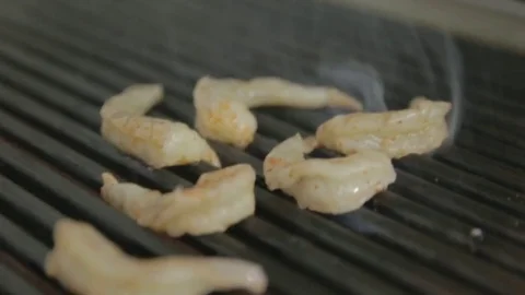 Delicious prawn spit on grill with flames Stock Footage 81431708