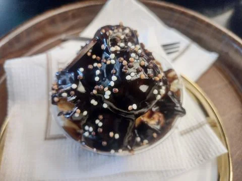 Delicious profiteroles on a plate 库存照片