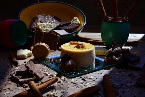 Delicious pudding surrounded by assorted traditional sweets Stock Photos