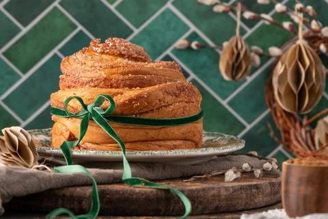 Delicious puff pastry Easter bread with cinnamon sugar coating tied with a .. Stock Photos