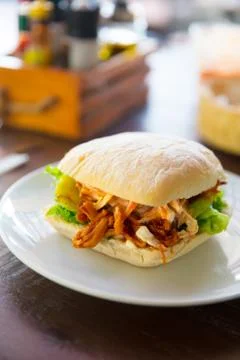 Delicious Pulled Pork Burger Served On Restaurant Table Stock Photos