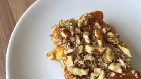 Delicious pumpkin dessert with walnut. 스톡 동영상 272635836