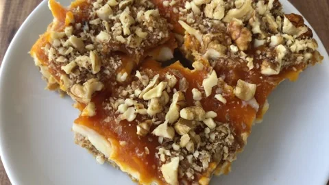 Delicious pumpkin dessert with walnut. Stock-Footage 272636011