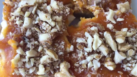 Delicious pumpkin dessert with walnut. Stock-Footage 272637399