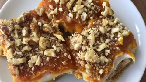 Delicious pumpkin dessert with walnut. Stock-Footage 272637424