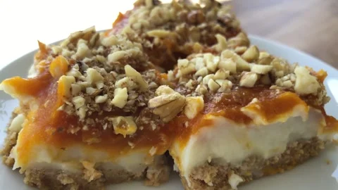 Delicious pumpkin dessert with walnut. Stock-Footage 272637574