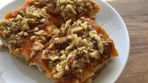 Delicious pumpkin dessert with walnut. Stock-Footage 272637651