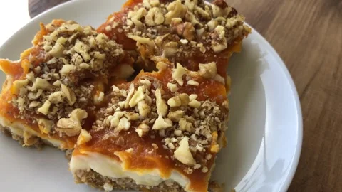 Delicious pumpkin dessert with walnut. Stock-Footage 272639014