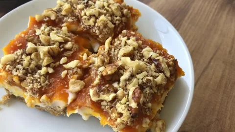 Delicious pumpkin dessert with walnut. Stock-Footage 272639227
