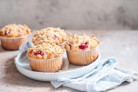 Delicious raspberry muffins Stock Photos