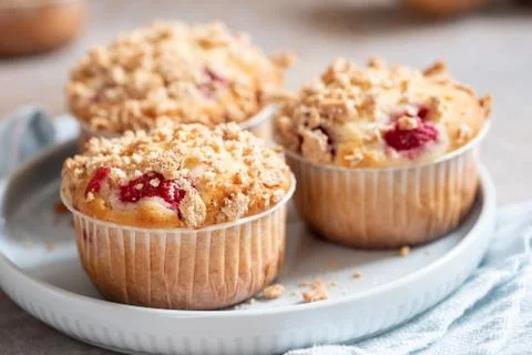 Delicious raspberry muffins Stock Photos