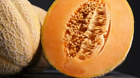 Delicious raw melons isolated on back background, tracking shot. Stock Footage 113674367