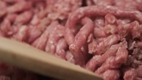 Delicious Red Minced Beef Meat and Wooden Spoon Macro View Stock Footage 145748694