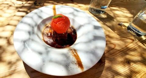 Delicious, refreshing dessert on a table in a cafe Stock Photos