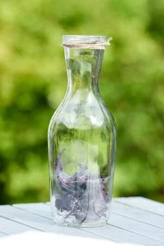 Delicious refreshing lemonade with basil, lime and strawberries Stock Photos