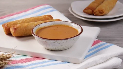 Delicious risoles on the plate with peanut sauce. Stock Footage 130160940