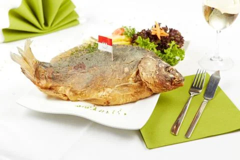Delicious roasted carp Stock Photos