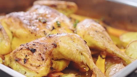 Delicious roasted chicken with vegetables. Stock Footage 151043736