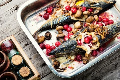 Delicious roasted mackerel fish in baking dish Stock Photos