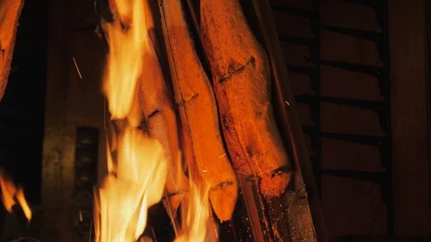 Delicious roasting Salmon smoked on open fire. Stock Footage 98317183