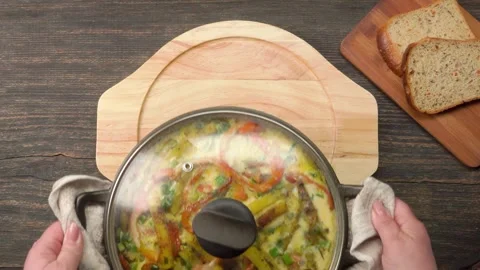 Delicious rustic potato and egg frittata in a skillet Video stock 314889956