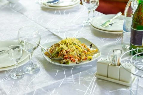 Delicious salad with vegetables on the table Stockfoto's