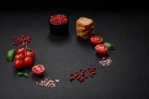 Delicious salted rectangular wheat croutons with salt and spices on a dark co 库存照片