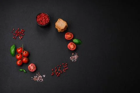 Delicious salted rectangular wheat croutons with salt and spices on a dark co Stockfoto's