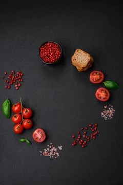 Delicious salted rectangular wheat croutons with salt and spices on a dark co 库存照片