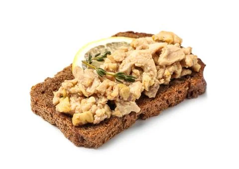Delicious sandwich with cod liver and piece of lemon isolated on white backgr Stock Photos