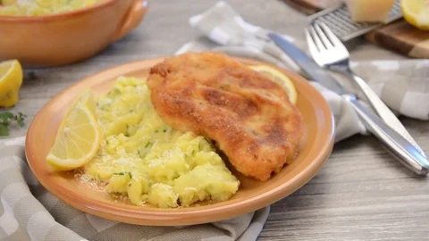 Delicious schnitzel with mashed potatoes with parmesan cheese Stock Footage 73574018