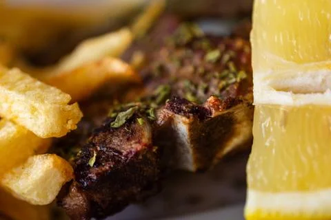 Delicious Serving Of Grilled Large T-Bone Steak Seasoned With Herbs By French Stock Photos